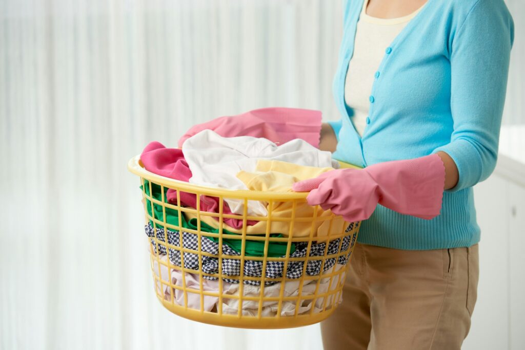 Young Woman Doing Laundry